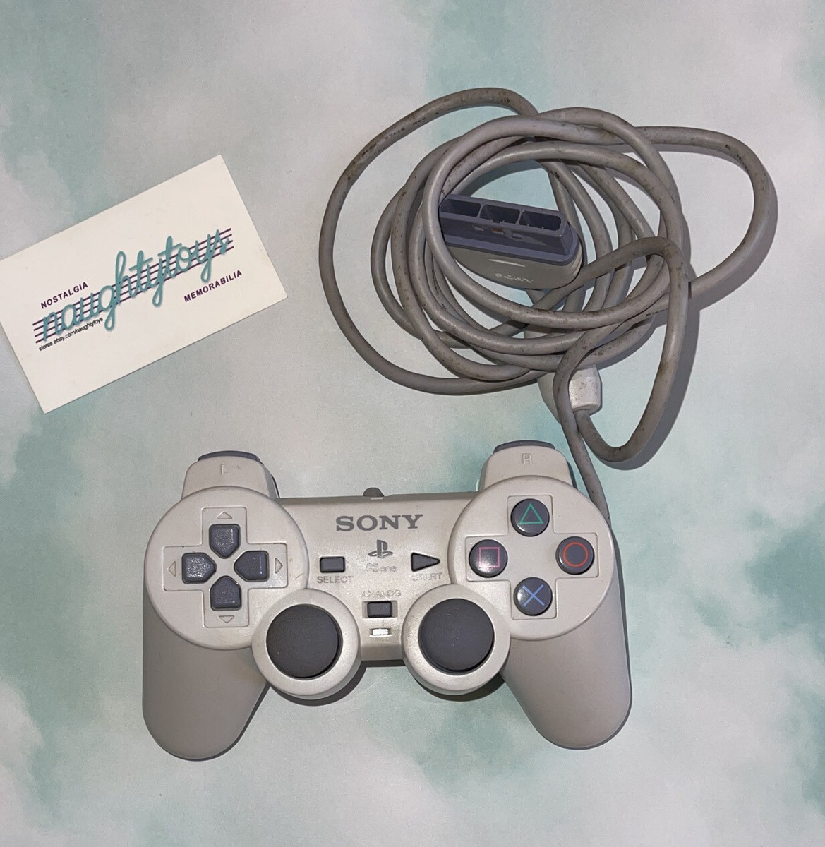 Manette Officielle Sony PlayStation 1 (PS1) Avec Câble - Modèle SCPH-110 - Occasion Fonctionnelle