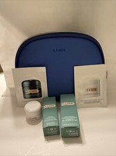 LA MER 6 PIECE TRAVEL SET -CLEANING ,EYE ,MOISTURIZER CREAM AND BAG