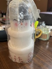 Winter Candle That says "Let it Snow" never been lit