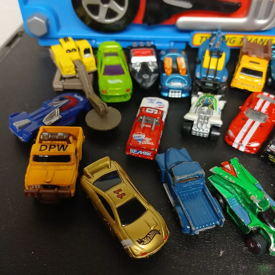 Racing Champions 1997, Tara Toy 1:14 lote mixto de 29 autos + estuche Hot Wheels Foto 3 de 4