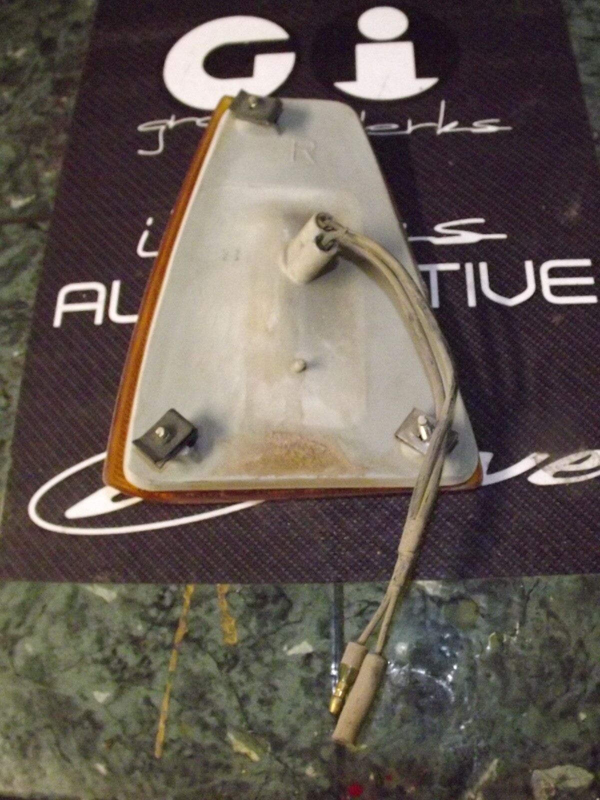 8082 Nissan Datsun B310 front corner marker light lens housing FR 230