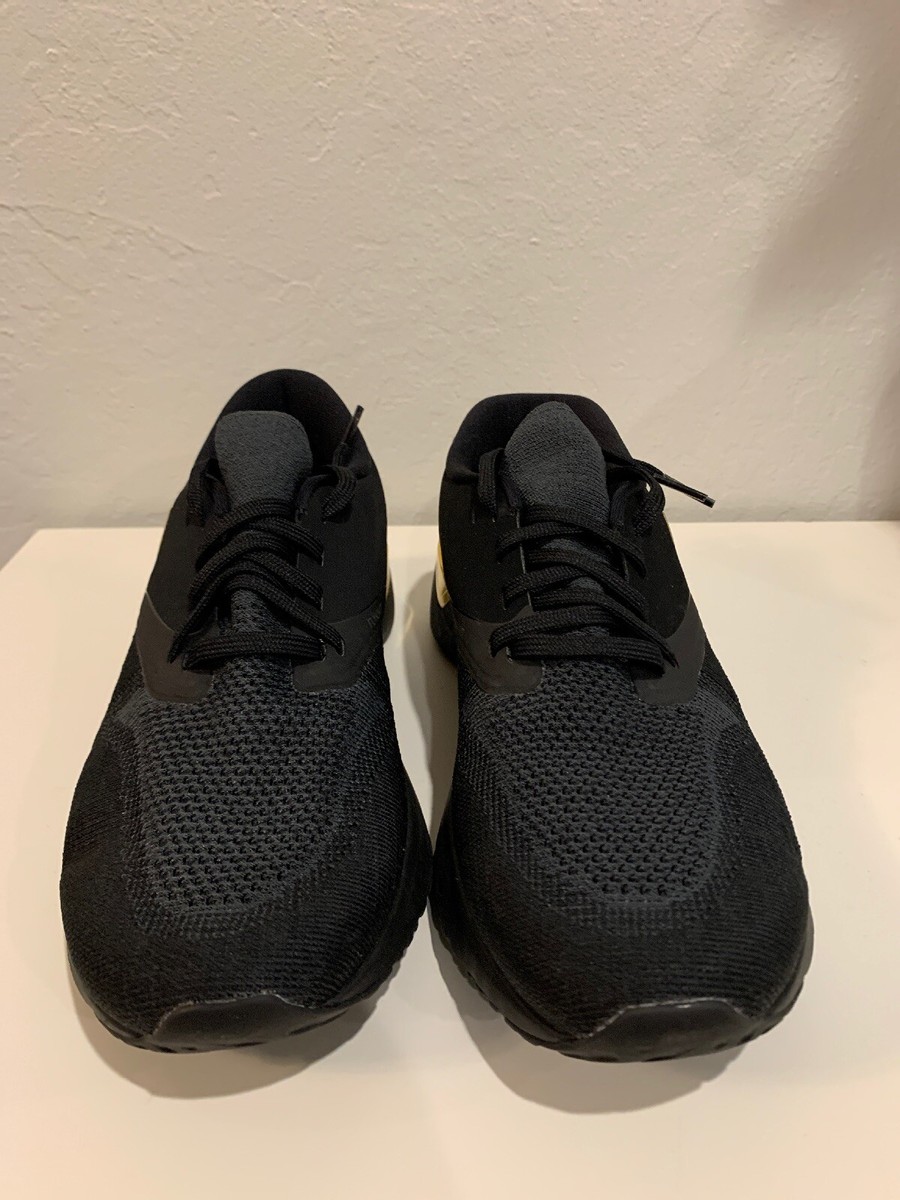 nike odyssey react flyknit 2 black and gold