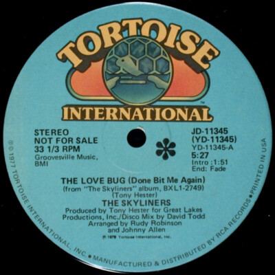 The Skyliners - The Love Bug (Done Bit Me Again) / Smile On Me (12'', Promo)