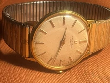 Universal Geneve Swiss Watch Yellow Gold plated Vintage Manual. USA Band