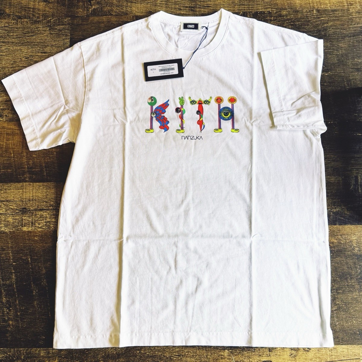 アイドル Kith For Nanzuka Gallery Tanaami Tee L KHM034355-101-Front.jpg?v=