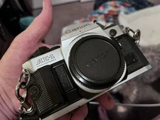 Canon AE 1 With 28mm Prime Lens, Flash And Power Winder