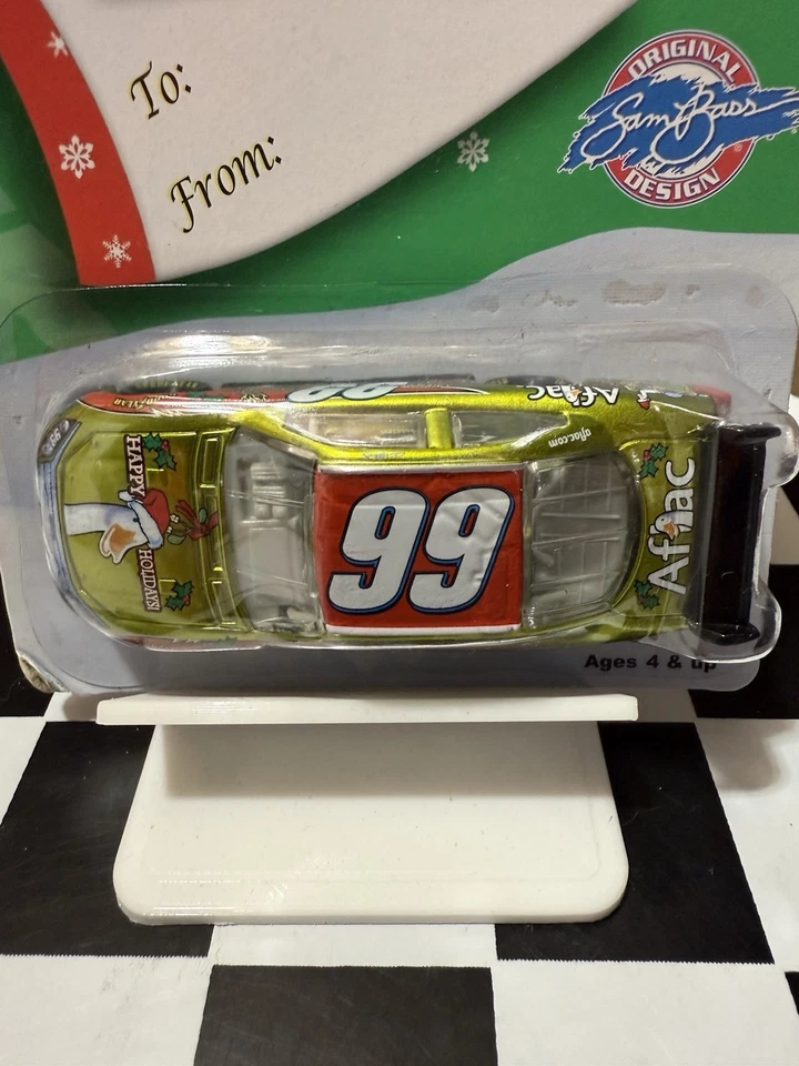 RARO* CARL EDWARDS #99 AFLAC SAM BASS VACACIONES 2009 1/64 CUNA COLOR LÍQUIDO FUNDIDO A PRESIÓN Foto 2 de 4