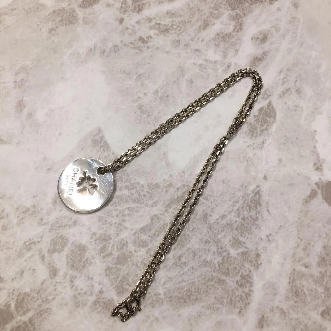 Collana unisex CHANEL con ciondolo quadrifoglio cambone argento 925