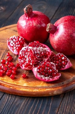Fresh Red Juicy Pomegranate by RawJoy Farms