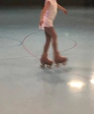 Riedell 120 Raven roller skates size 4 with BonesSwiss bearings