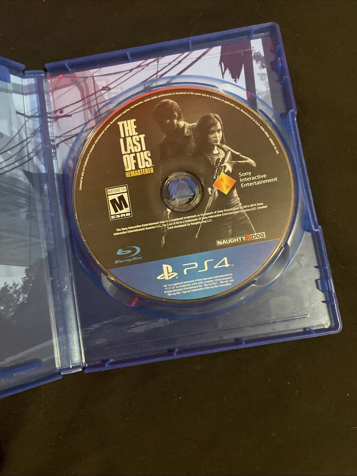 PS4 Slim 1TB Console. Comes with Controller and Cords and Four Disc Games. Used - Image 3 of 4