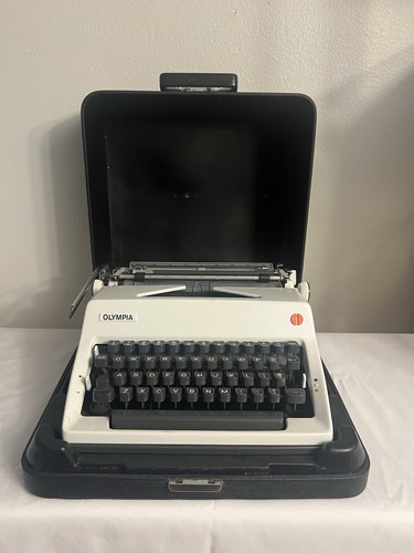 Vintage 1971 Olympia SM9 Deluxe tragbare Schreibmaschine mit Koffer Serie 4429263 neues Farbband
