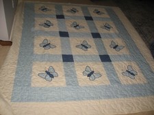 vintage hand made machine quilted quilt appliqued butterflies shades of blue