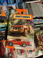 2020 Mattel Matchbox MBX Jungle 62/100 ‘95 Nissan Hardbody D21 Pickup Truck Red