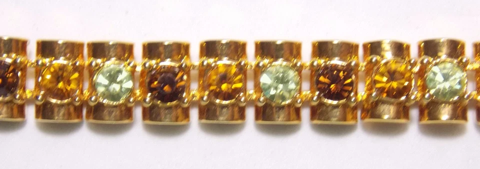 Pulsera de tenis firmada PD PREMIER DESIGNS, HORIZONTE, cristales de topacio/ámbar/peridoto Foto 2 de 4