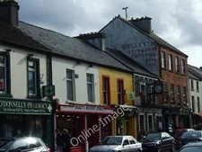 Photo 6x4 Market Street, Swinford Beal Atha na Muice Row of shops and pub c2010
