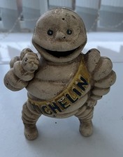 VINTAGE COLLECTIBLE MICHELIN MAN FIGURE CAST IRON HEAVY MONEY BOX.