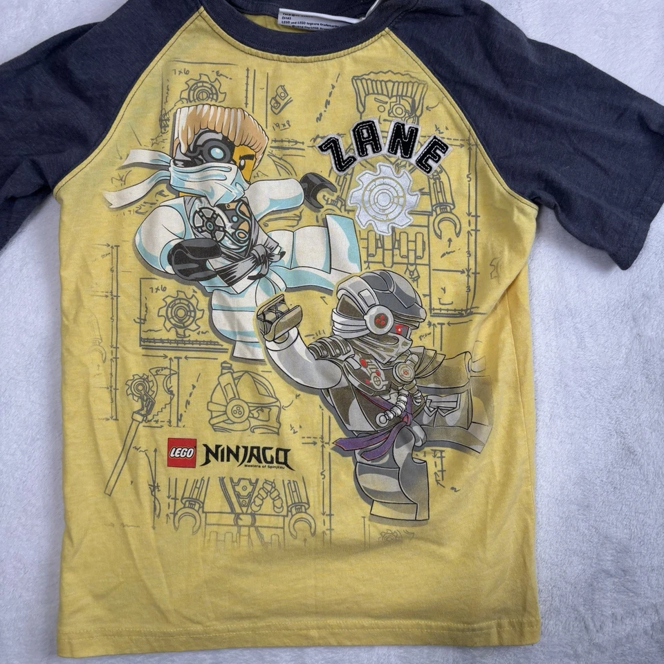 Lego DC Super Heroes Ninjago Zane Yellow Grey Shirt Kids Size 6/7 - Image 2 of 4