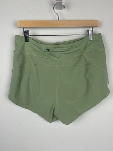 Pantaloncini corti Athleta Run With It verde oliva taglia M 3,5" cucitura interna tasca zip - Foto 4 di 8