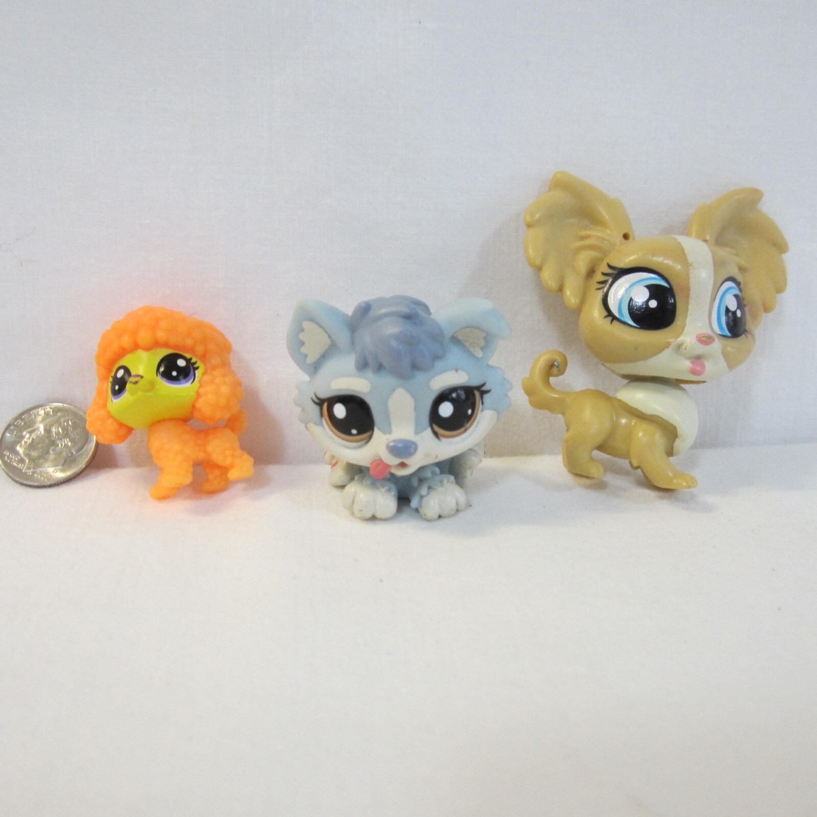 Three Little Pet Shop Figurines; Wiped Out Kitten, Orange Poodle, Fluffy Puppy