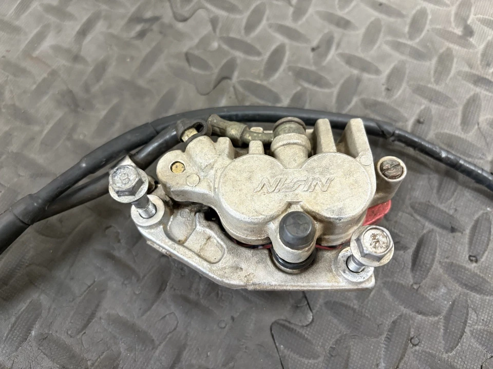 Yamaha YZ250F 2006 OEM NISSIN PINZA DE FRENO DELANTERA CILINDRO MAESTRO 1C3-2580T-00-0 Foto 2 de 4