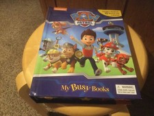 Pre Owned Paw Patrol My Busy Book. Storybook,12 Figurines, Playmat. Nickelodeon