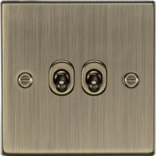 KNIGHTSBRIDGE SQUARE EDGE ANTIQUE BRASS SWITCHES AND SOCKETS BLACK INSERT