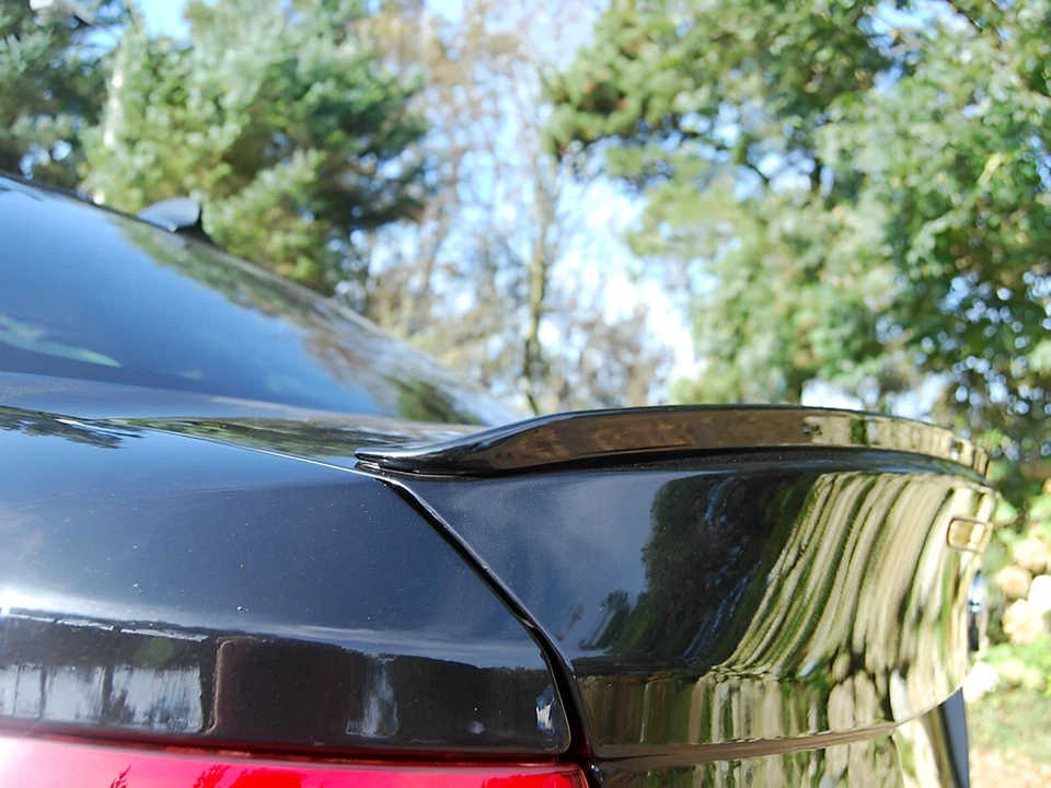 Alerón labial de maletero pintado negro (color personalizado) R para Cadillac DTS sedán 06-11 Foto 2 de 4