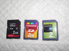LOT OF 7 SD MEMORY CARDS, 2-4GB, 3-2GB, 2-1GB, SANDISK, LEXAR, FUJI, TRANSCEND