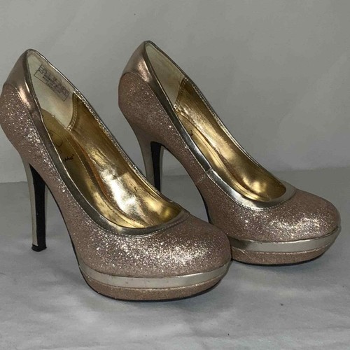 gold platform pumps