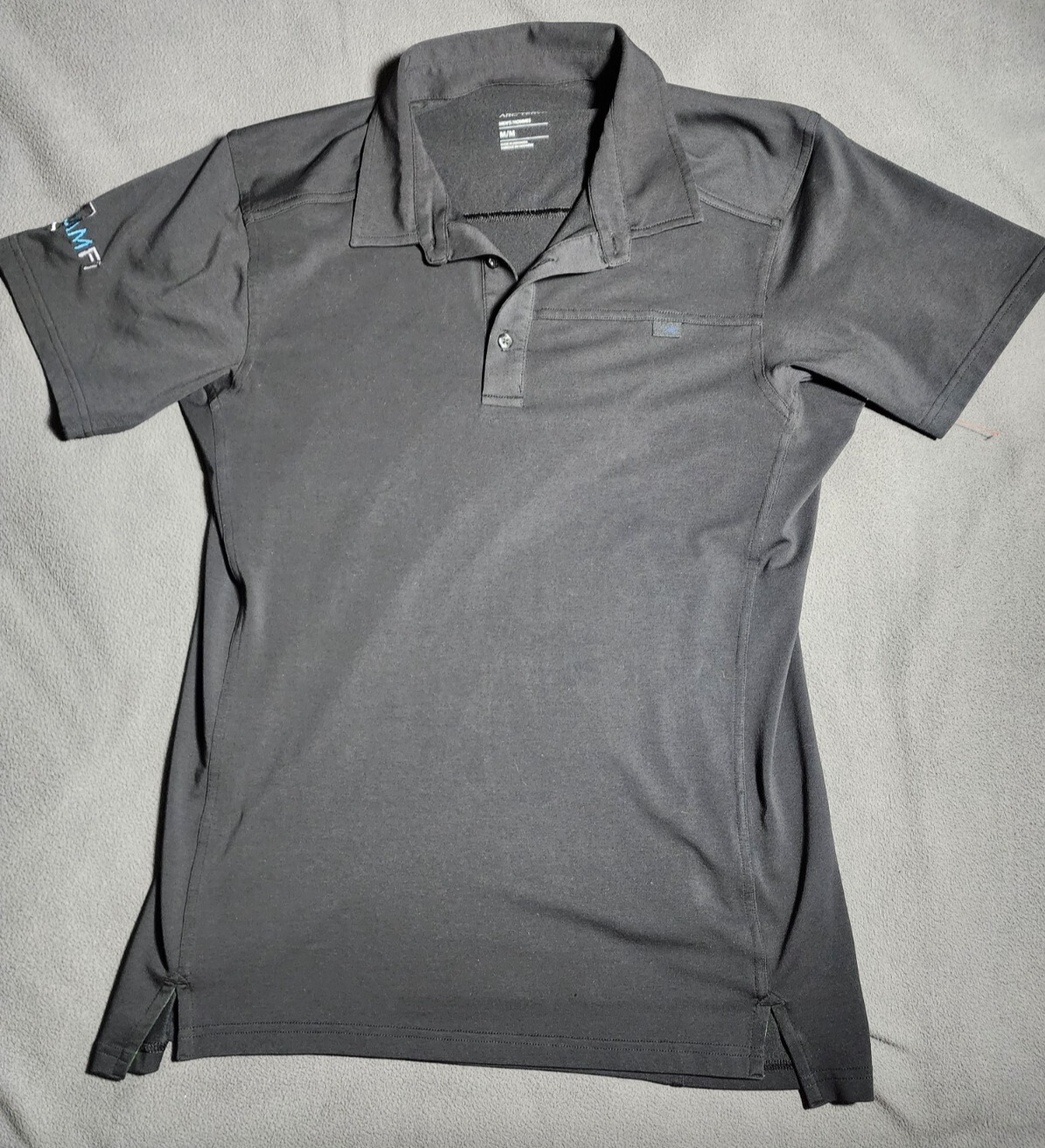 ARC'TERYX Polo Arc’Teryx uomo media nera manica corta quarti bottoni logo azienda