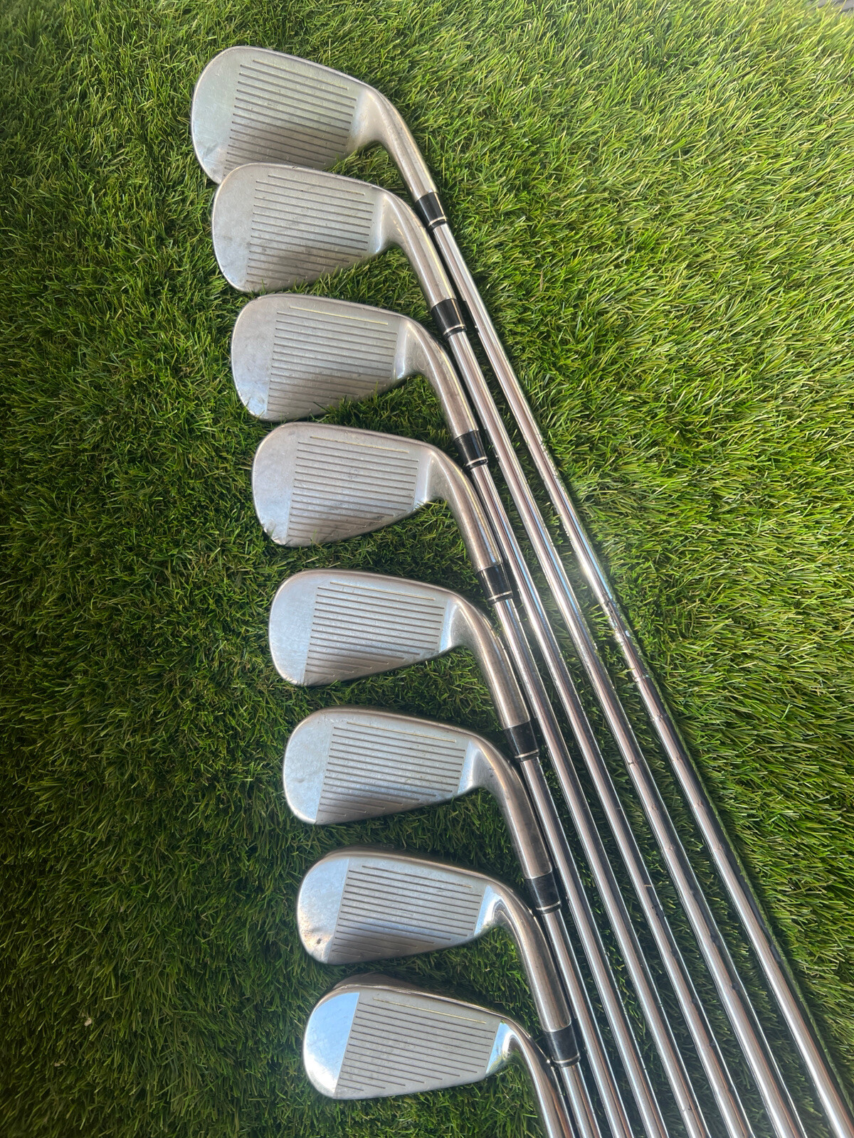 LOVELY LEFT HANDED SET OF TAYLORMADE BURNER 2.0 IRONS. 4 TO SAND WEDGE