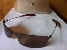 New DKNY 7261S 705 Sunglasses, Shiny Bronze / Dark Brown lenses