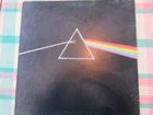 Pink Floyd Dark side of the Moon Vinyl with cards and posters.