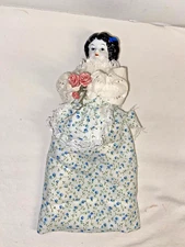 Vintage Victorian Doll With Porcelain Face & Blue Hair Bows Holding Flowers 11"