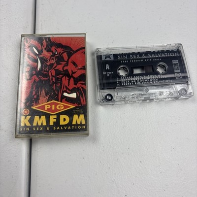 KMFDM vs. PIG - Sin Sex & Salvation (Cassette Tape ). (1994)