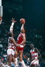 Philadelphia 76ers' Julius Erving jumps 1980's Basketball photo 1