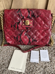 red snakeskin bag