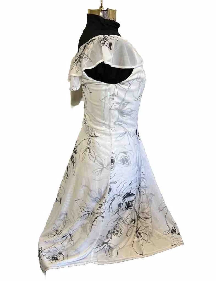 Vestido para mujer Le Chateau estampado floral granulado crepé cuello en V blanco y negro talla XS Foto 2 de 4