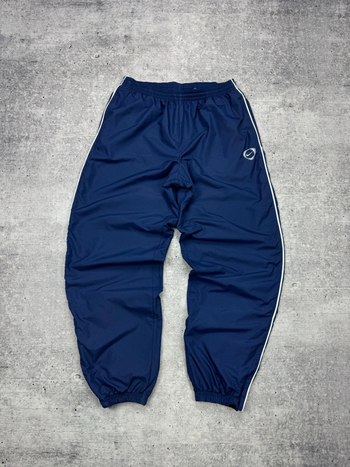 Pantalon de survêtement jogging vintage Nike années 90 style Y2K logo nylon swoosh