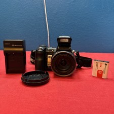 Sony Cyber-Shot DSC-H7 8.1MP Digital Camera 15x Optical Zoom w/Battery Charger