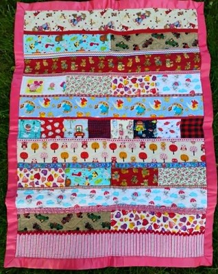 Brand New Handmade red flannel baby quilt for a girl or a boy