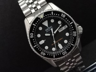 seiko skx013k2 black dial automatic divers midsize watch
