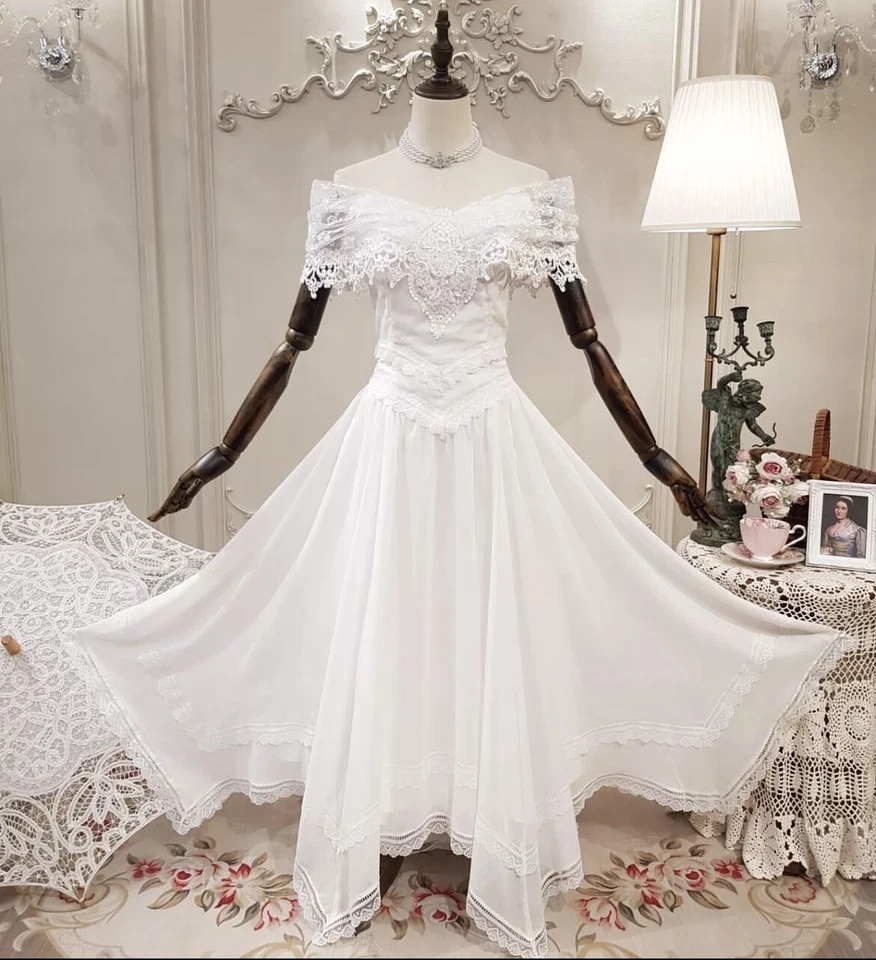 Vestidos de novia cortos de gasa con hombros descubiertos blancos marfil hasta el té Foto 4 de 4