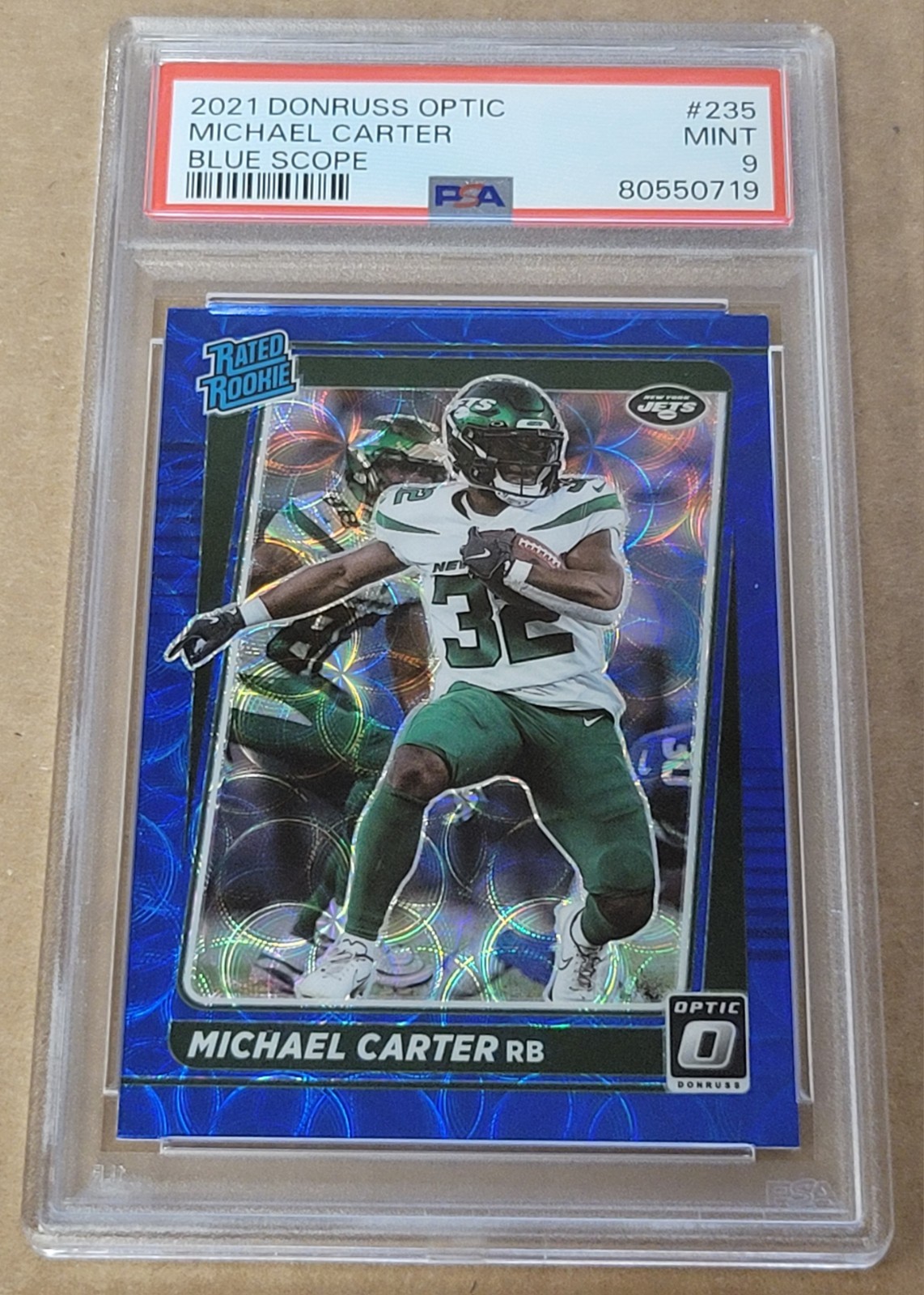 2021 Panini Donruss Optic #235 Michael Carter Rated Rookie Blue Scope PSA 9