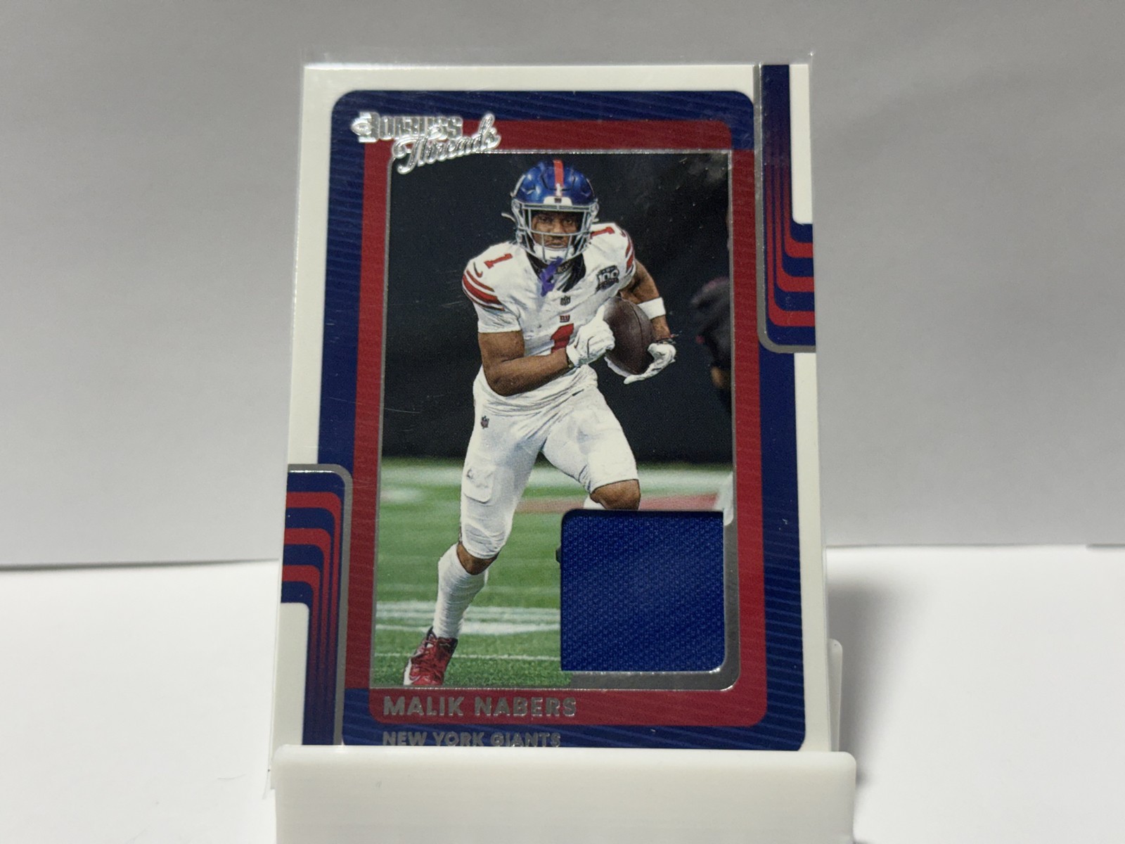 Malik Nabers #DTH-MNS Football Cards 2025 Panini Donruss Threads trading card — raw and PSA graded price guide