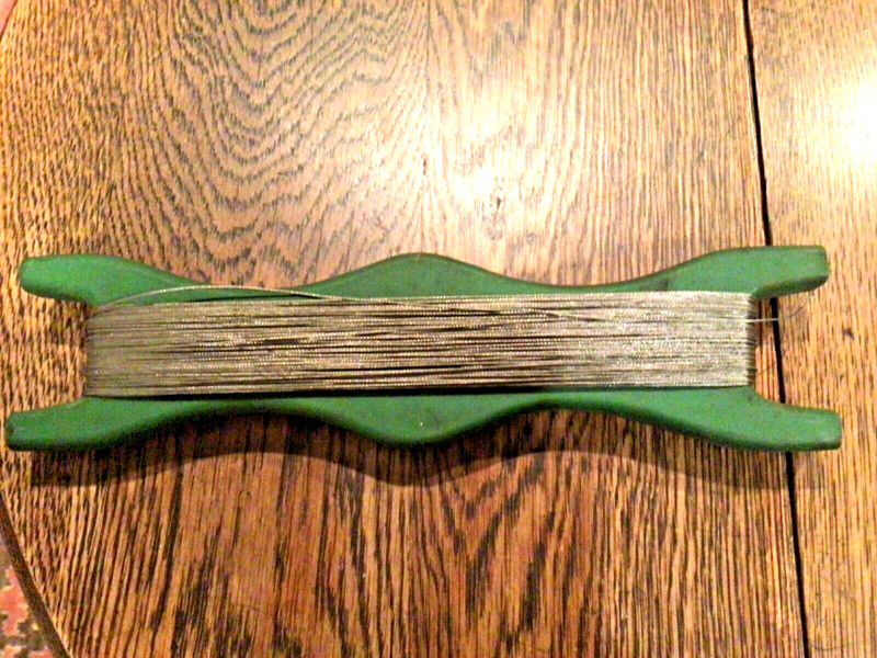 Vtg wooden holder w Monel Trolling Strand M730 45 lb,made in USA
