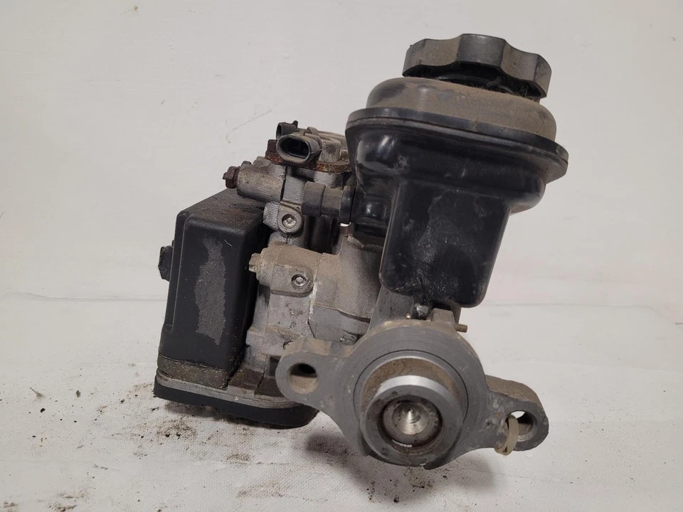 Conjunto de bomba y motor ABS usado se adapta a: Chevrolet Beretta 1994 montaje grado A Foto 2 de 4