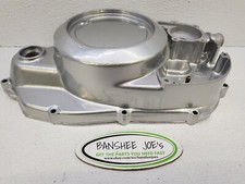 Cubierta de embrague Yamaha Banshee recién recubierta de polvo plateada OEM # 2GU-15421-00-00