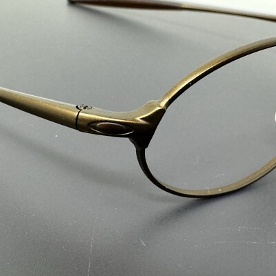 OAKLEY e-wire グレーオーバルサングラス Oakley E Wire サングラス